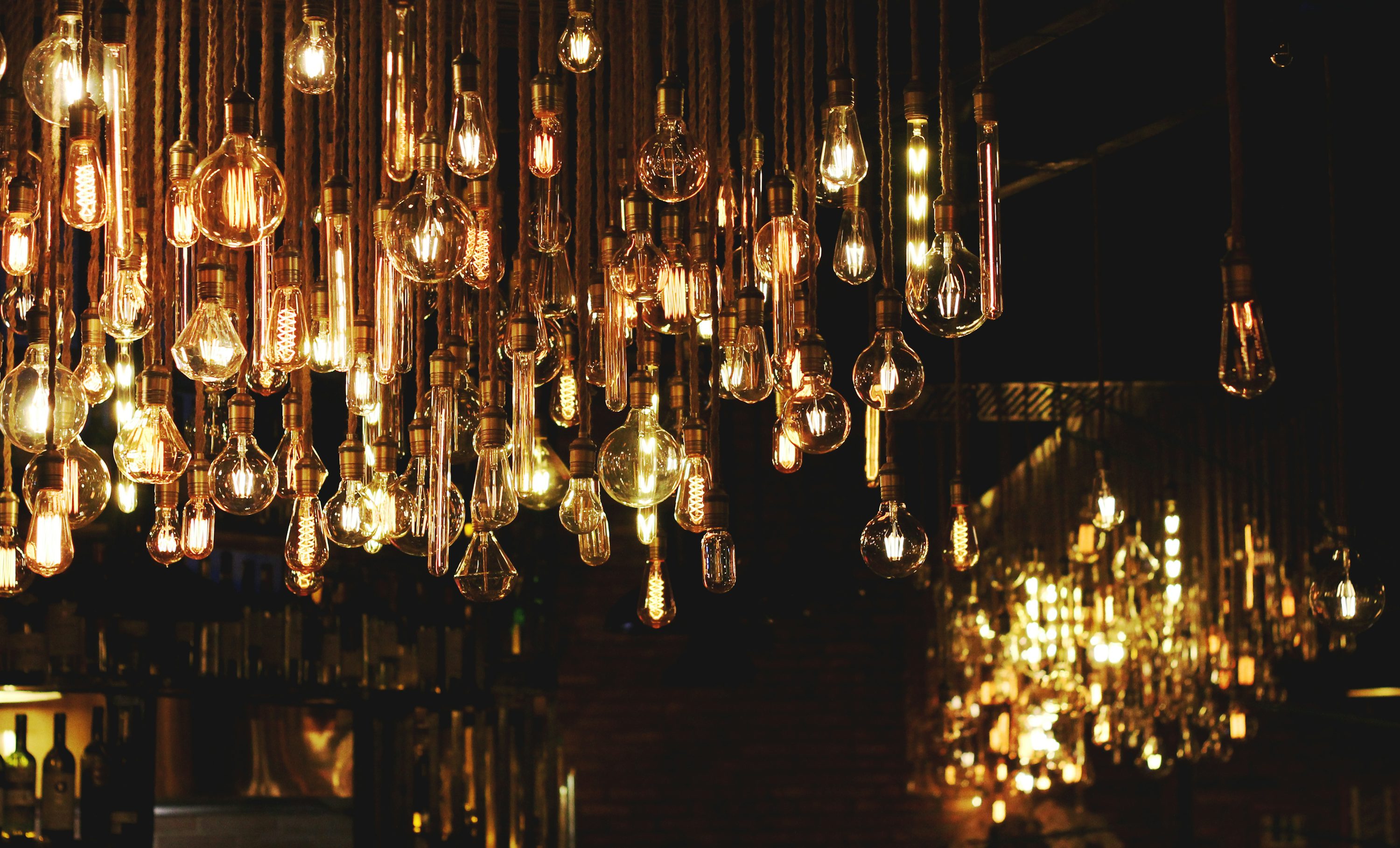 A collection of glowing lightbulbs, symbolizing creative ideas.